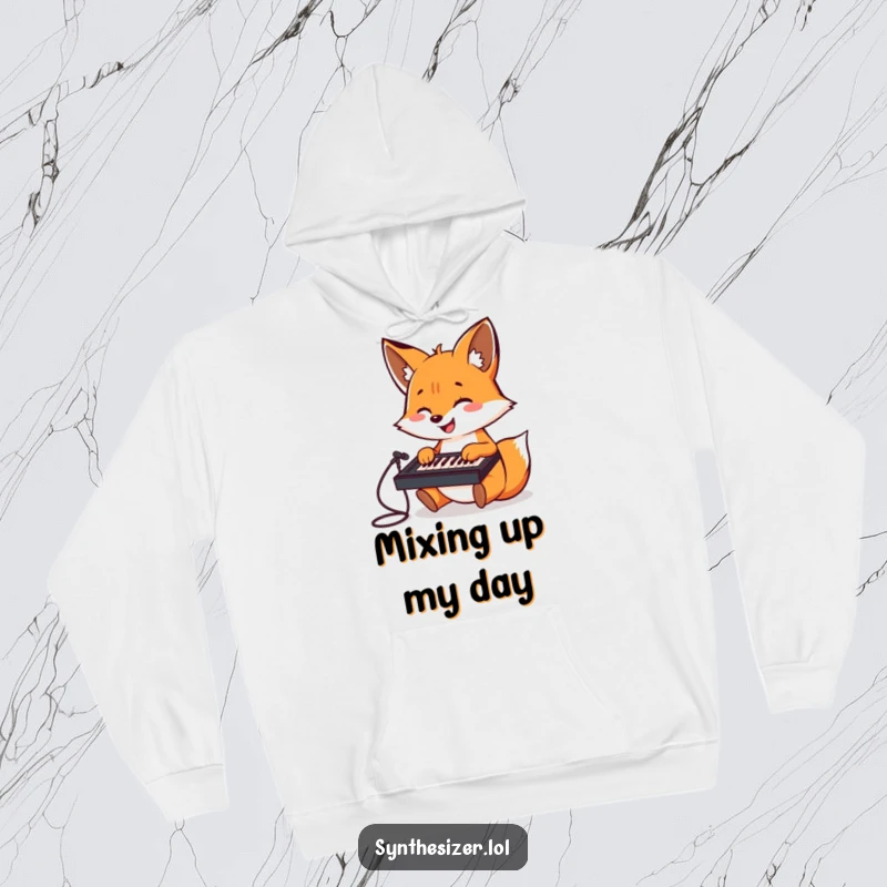 Funny Fox DJ Hoodie: A cheerful fox is shown gleefully playing a tiny keyboard mixer, embodying the joy of music creation.